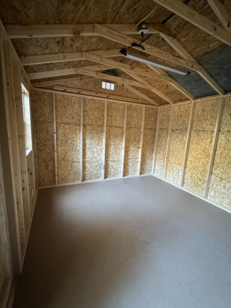 Insulate and finish shed walls: shed before any insulation