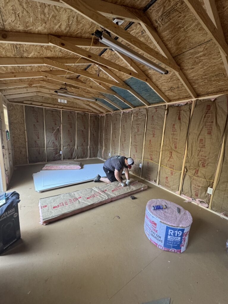 insulate and finish shed walls: installing wall insulation