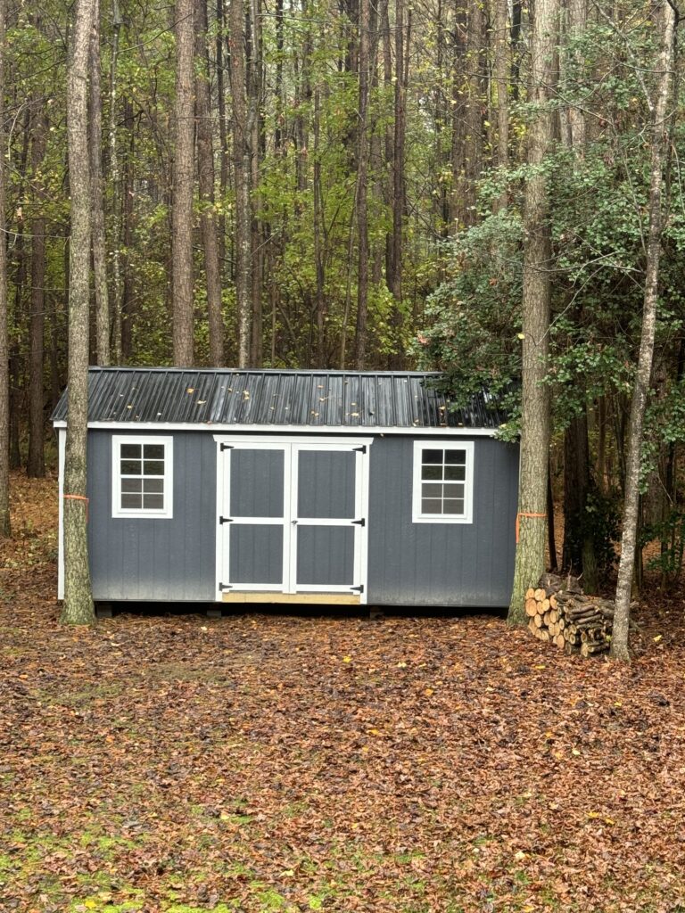 Home Office: Exterior before photo of our backyard shed to office conversion.